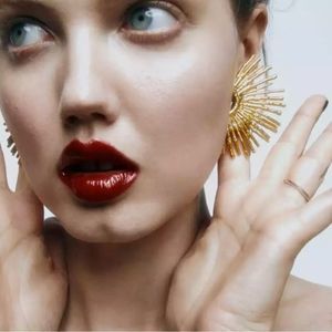 Sun radiant earrings in gold